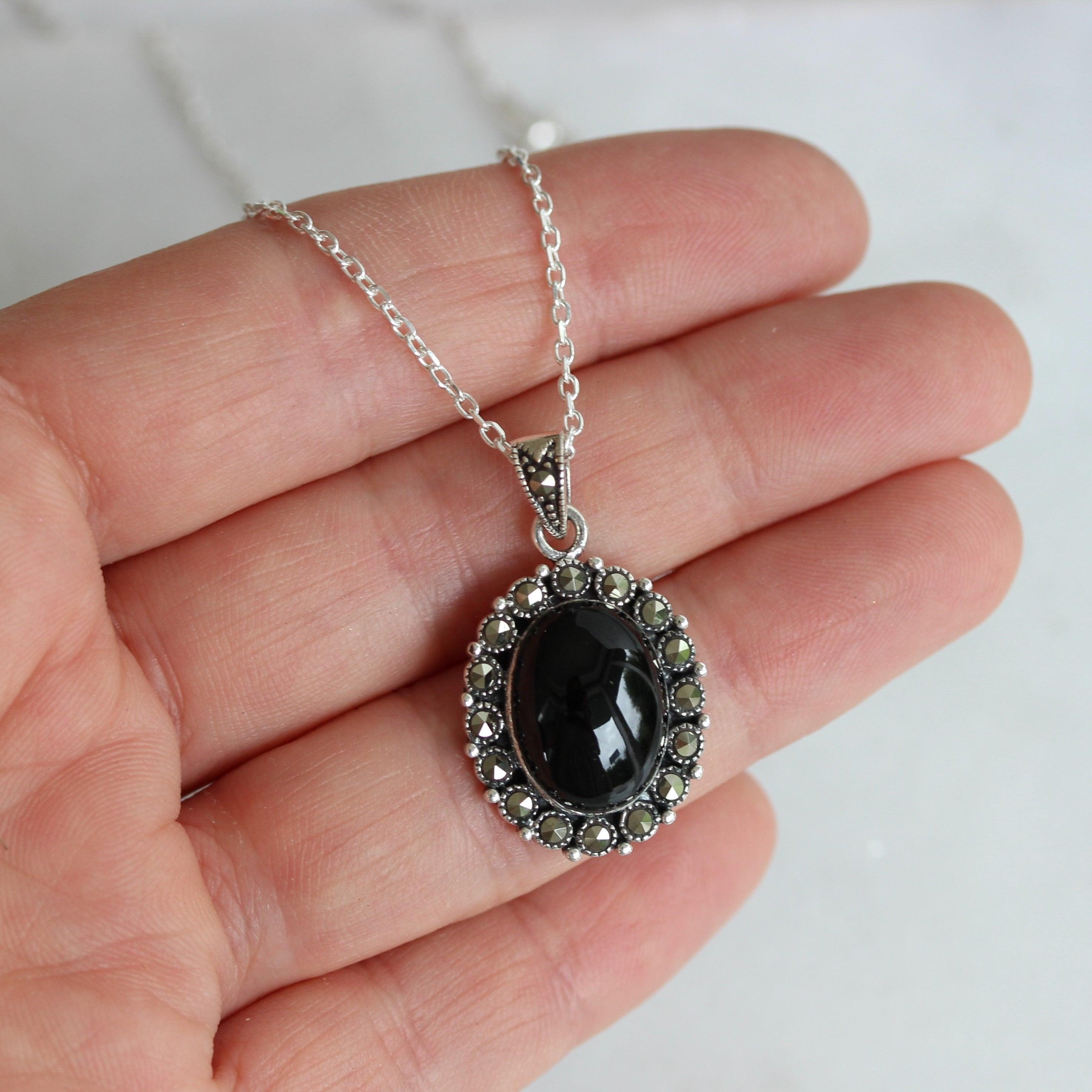 Sterling Silver Black Onyx Oval Halo Necklace - STERLING SILVER DESIGNS